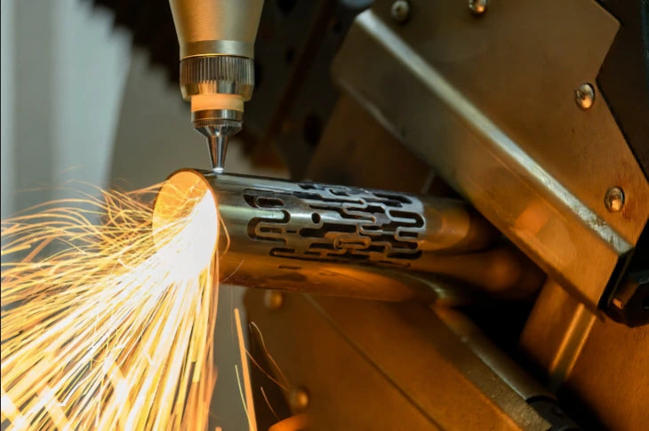 Laser cutting a detailed pattern into steel tubing