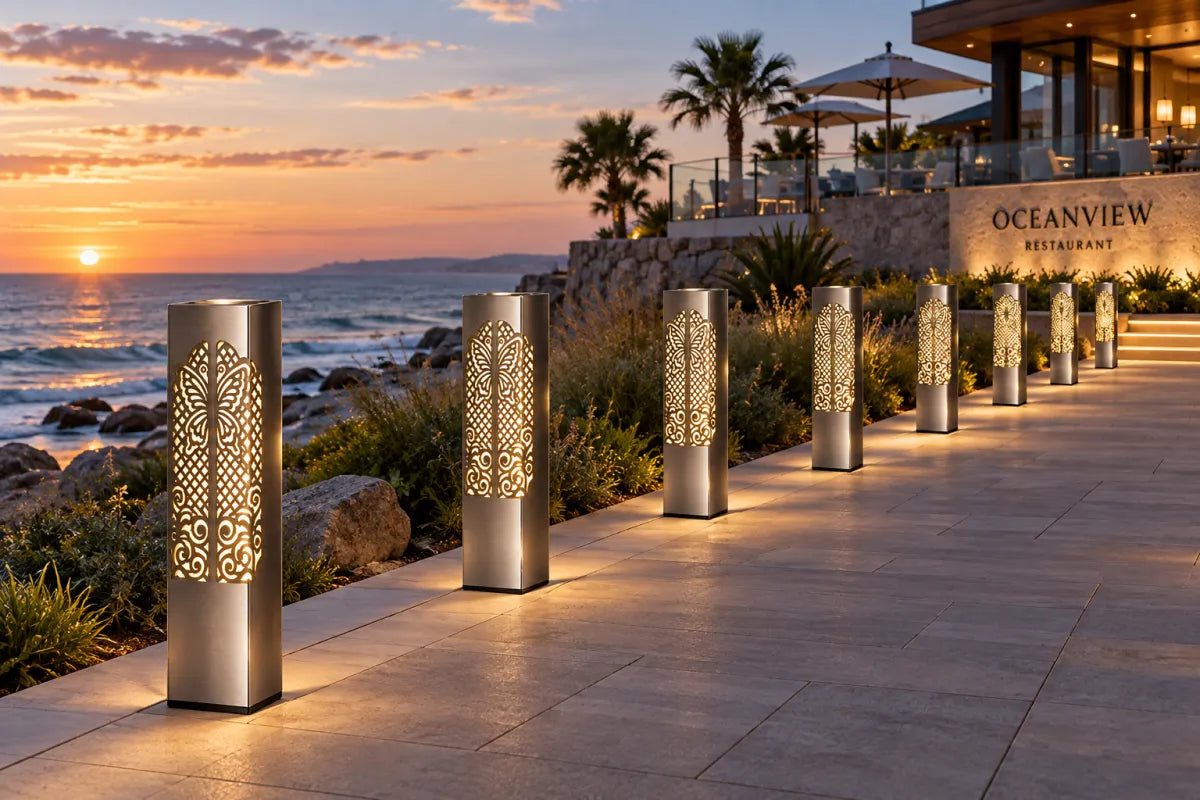 Stainless-steel ProSteel Lumina architectural light columns illuminating a waterfront walkway